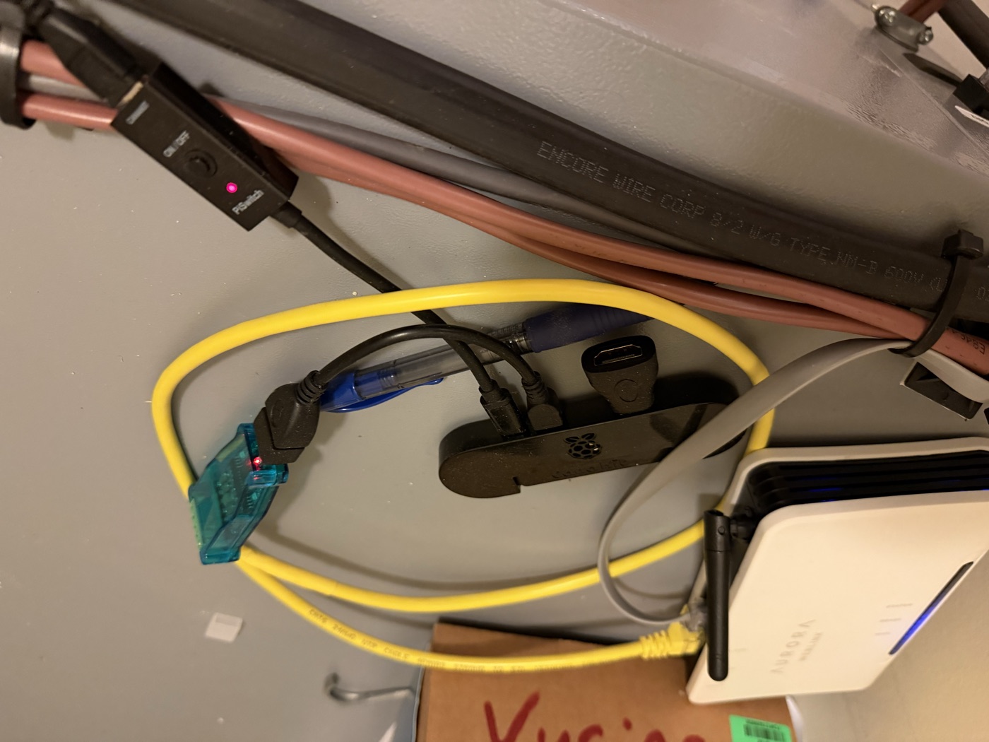 The finished Jumboshack sender: WaterFurnace Aurora control, Raspberry Pi, the DSD TECH RS-485 adapter lit up, the Ethernet tap cable, and the PiSwitch, all in place by the air handler